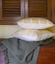 Load image into Gallery viewer, Close up of the hand block printed Mustard Yellow cotton cushion covers on a hand woven cotton grey throw blanket